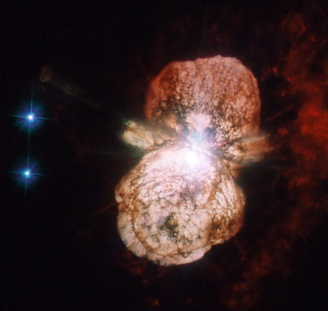 Eta Carinae’s Homunculus Nebula: two bright lobes of gas billowing away from the star in opposite directions, the debris of its 1840s eruption.