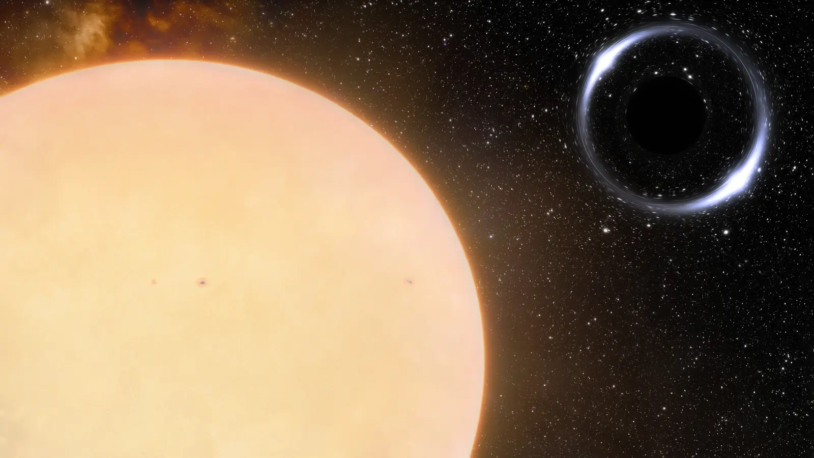 An artist’s impression of the nearest known black hole and its Sun-like companion star, the star’s light drawn into a warped ring around the invisible mass.