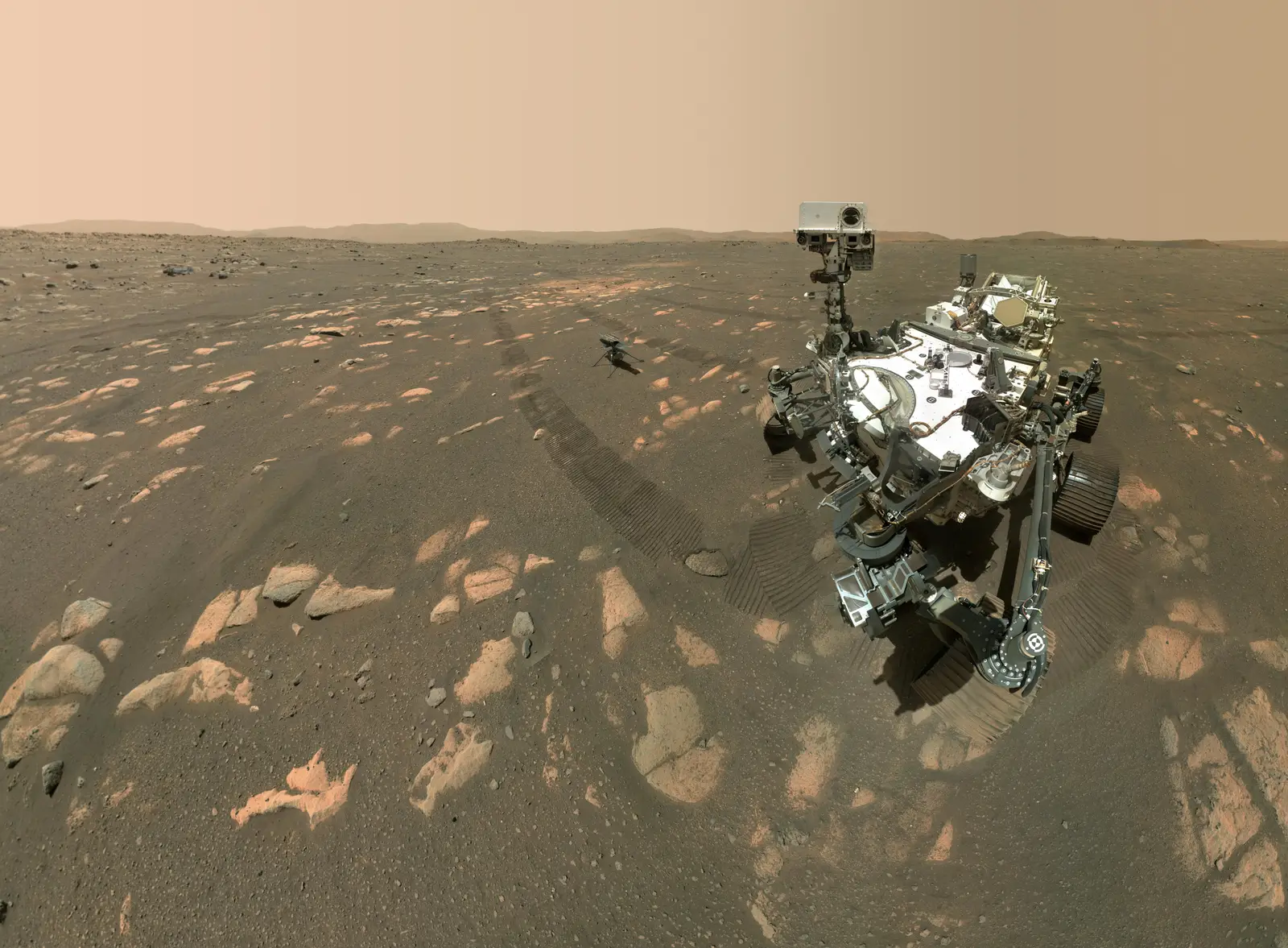 The Perseverance rover’s selfie on the rust-red Martian surface, with the small Ingenuity helicopter sitting on the ground a few metres away.
