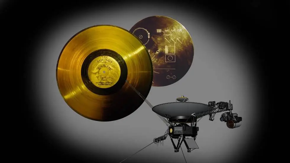 The Voyager Golden Record: a gold-plated phonograph disc in its engraved aluminium cover, marked with the diagrams that explain how to play it.