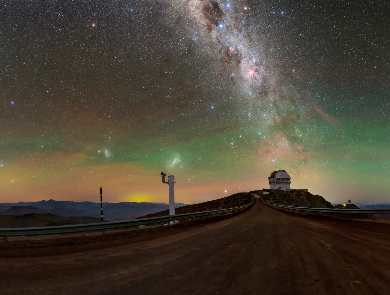 A genuinely dark observatory sky, richly coloured with airglow and the Milky Way, showing how much structure is visible when artificial light is absent.